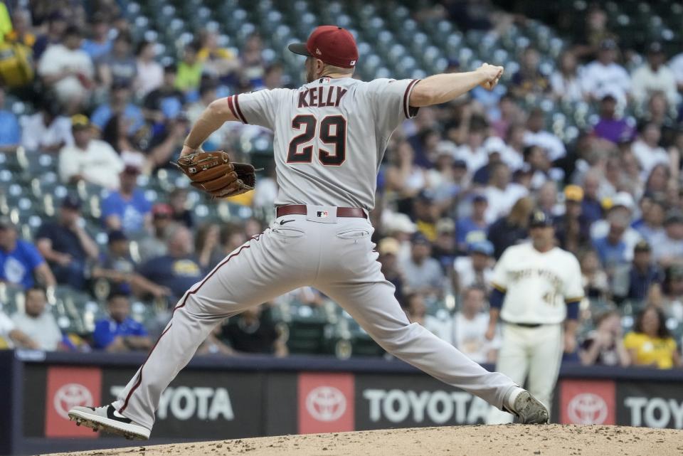 Arizona Diamondbacks starting pitcher Merrill Kelly throws during the first inning of a baseball game against the Milwaukee Brewers Monday, June 19, 2023, in Milwaukee. (AP Photo/Morry Gash)