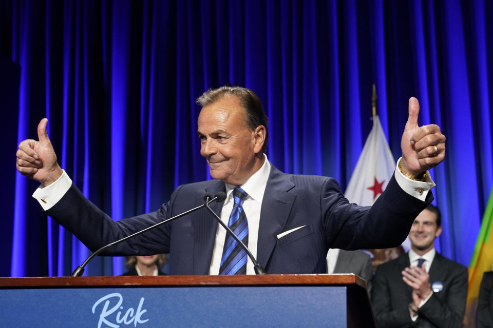 Los Angeles mayoral candidate Rick Caruso gives a thumbs-up to the crowd in his election-night headquarters Tuesday, Nov. 8, 2022, in Los Angeles. (AP Photo/Marcio Jose Sanchez)