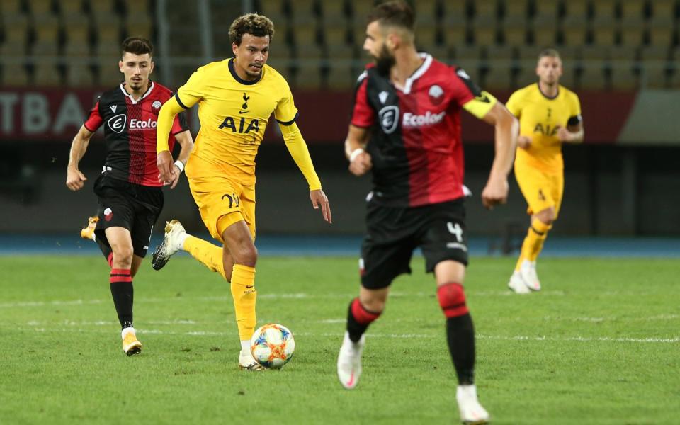 Tottenham's Dele Alli, second left, runs with the ball during a Europa League third qualifying round soccer match between Shkendija and Tottenham  - AP