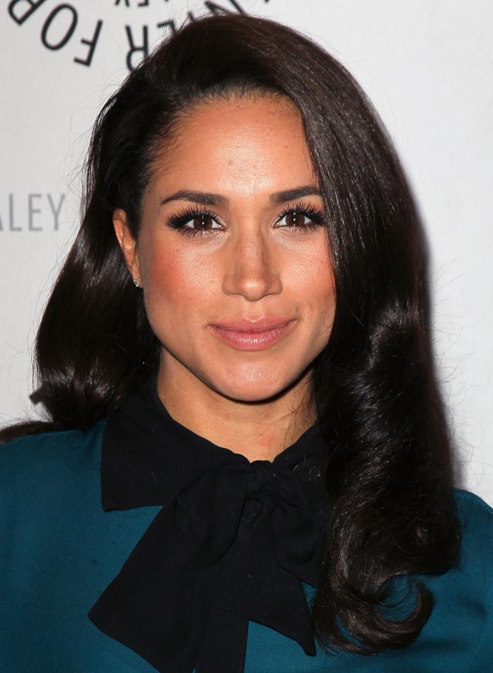 Meghan with sleek wavy hair in 2013