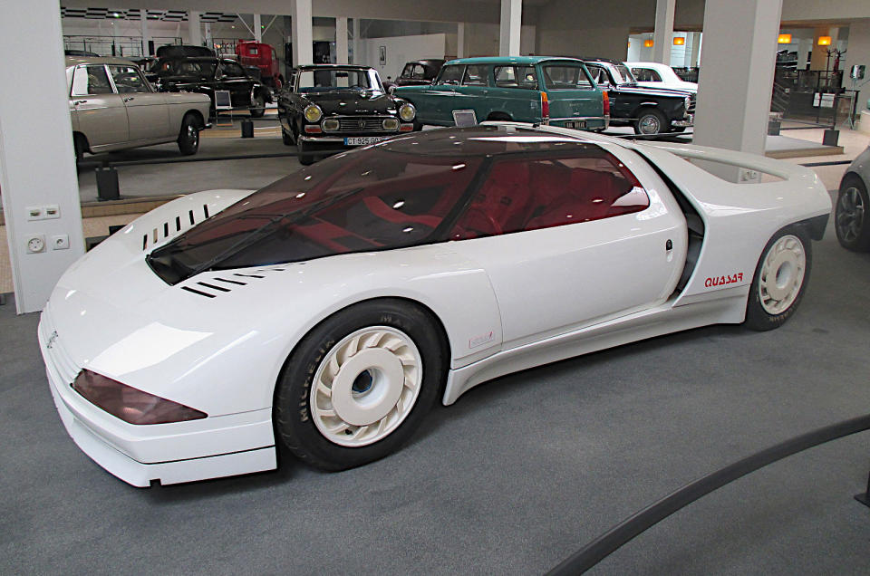 <p>If it had ever gone into production, the Quasar might have been an era-defining supercar of the 1980s. Its low, sleek body, featuring the by now almost compulsory scissor doors, covered the same mechanicals used in the <strong>205 Turbo</strong>, a turbocharged, mid-engined, four-wheel drive <strong>homologation</strong> special which put Peugeot at the top of World Championship rallying.</p><p>With two turbos rather than just one, the Quasar’s <strong>1.8-litre</strong> four-cylinder engine was reputed to produce <strong>600bhp</strong>, well over 100bhp more than the road-going version of the slightly later <strong>Ferrari F40</strong>.</p>