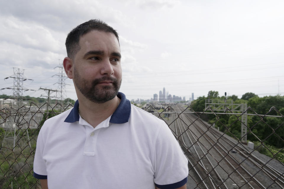 Fernando Hermida, who has moved several times to access HIV treatment, stands for a portrait in Charlotte, N.C., on May 26, 2024. (AP Photo/Laura Bargfeld)