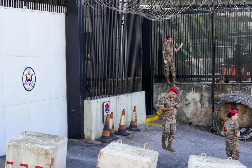 Lebanese Army investigators collect forensic evidence outside U.S. Embassy in Aukar, a northern suburb of Beirut, Lebanon, Thursday, Sept. 21, 2023. Lebanon's security agencies have launched an investigation into a late night shooting outside the U.S. embassy in Lebanon that caused no injuries, officials said Thursday. (AP Photo/Hassan Ammar)