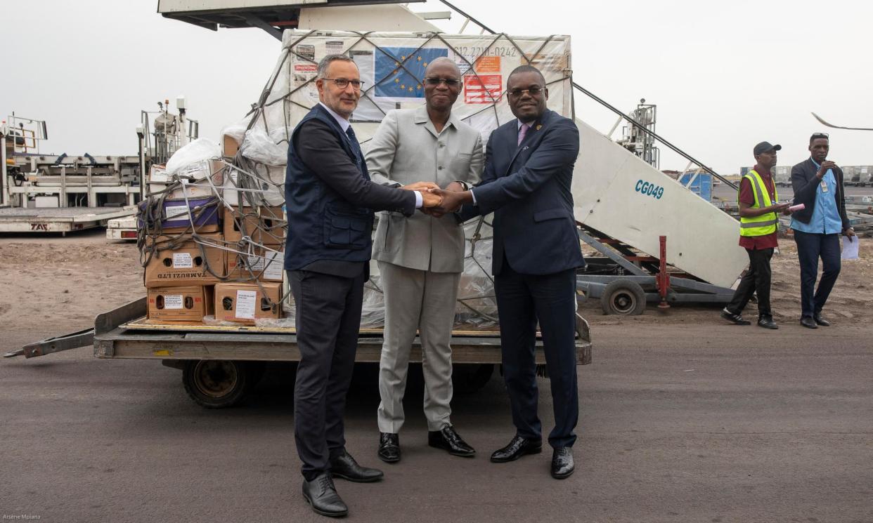 <span>The first batch of Bavarian Nordic’s mpox vaccine, donated by the EU, arriving at Kinshasa airport. From left, Laurent Muschel, of the EU’s health authority; the DRC’s health minister, Samuel Roger Kamba; and head of the Africa CDC, Dr Jean Kaseya. </span><span>Photograph: EU/AFP/Getty</span>