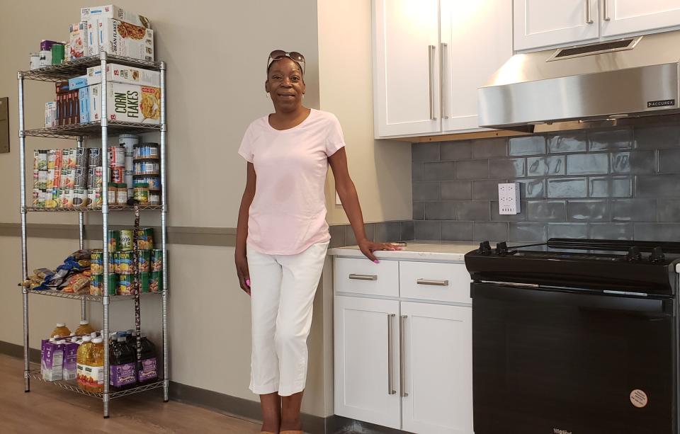 Richford Arms resident Tonya Gray, 59, in the affordable housing complex's new community room.