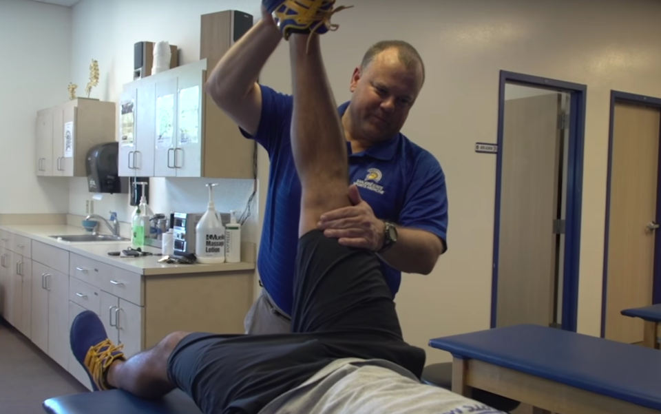 Scott Shaw, pictured here stretching an athlete's leg in a San Jose State promotional video.