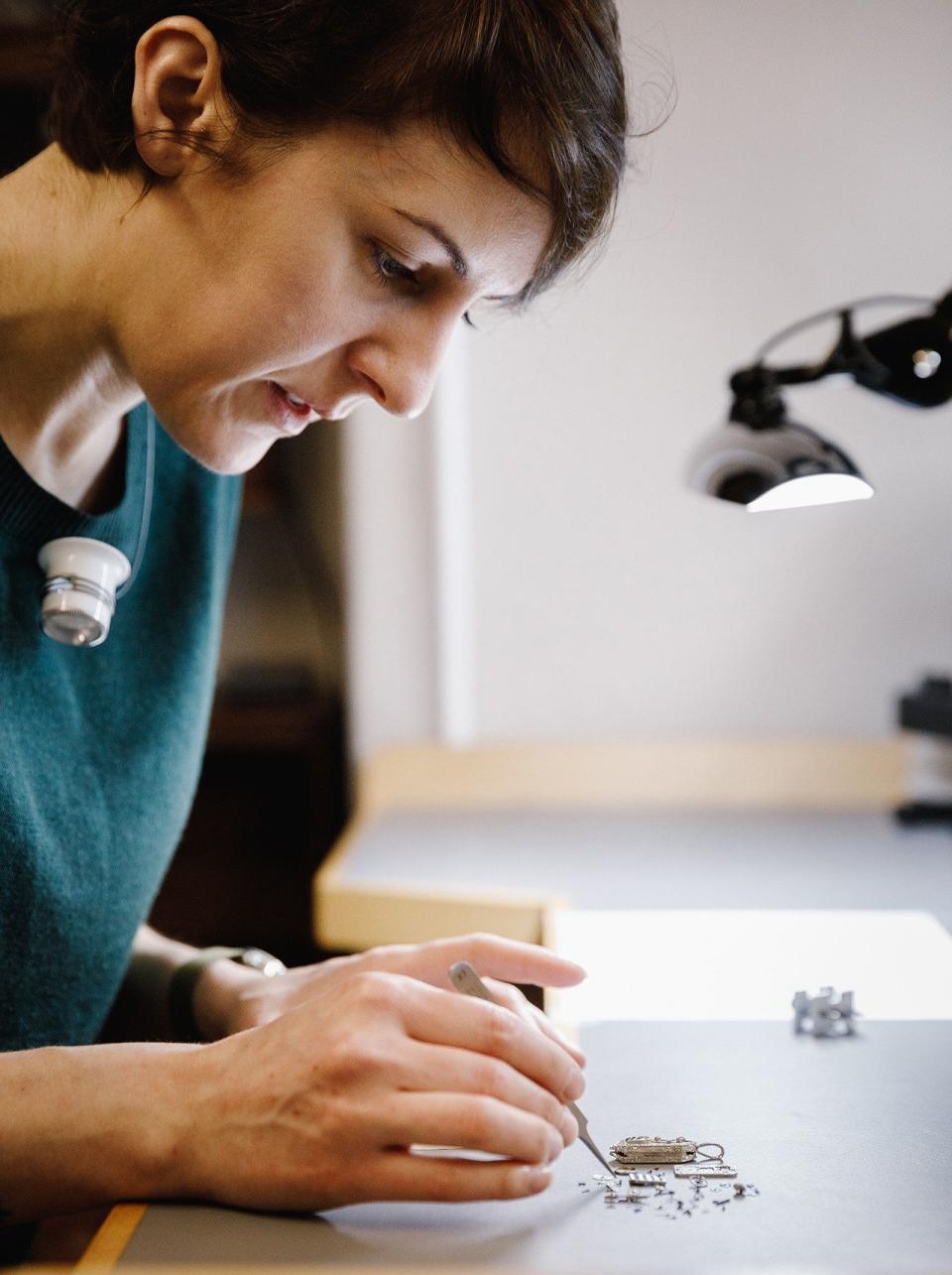 Rebecca focused in the Strutherses Leek workshop - India Hobson