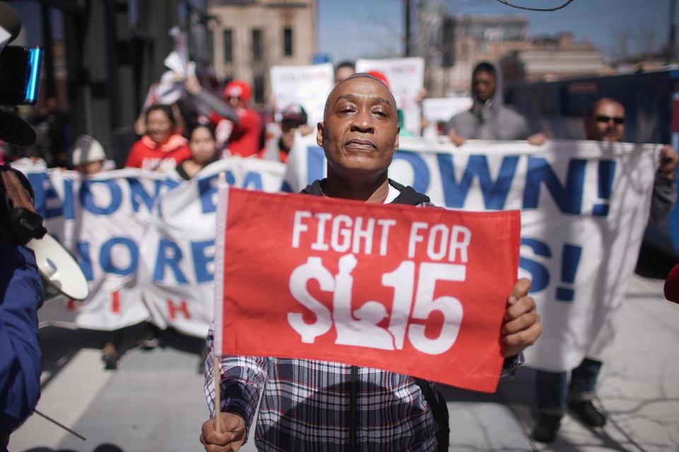 CHICAGO, ILLINOIS - APRIL 03: Demonstrators march in front of the McDonalds Headquarters demanding a minimum wage of $15-per-hour and union representation on April 03, 2019 in Chicago, Illinois. McDonald’s recently announced that the company would no longer lobby against increases in minimum-wage. Similar demonstrations were held in 10 cities around the country today.   (Photo by Scott Olson/Getty Images)