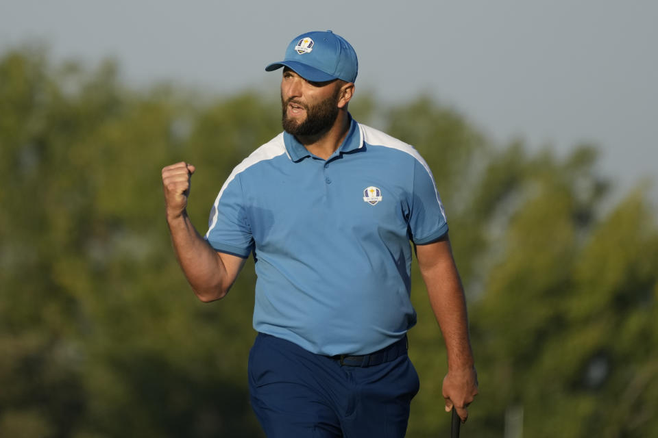 Europe's Jon Rahm celebrates after his putt on the 3rd green during his morning Foursome match at the Ryder Cup golf tournament at the Marco Simone Golf Club in Guidonia Montecelio, Italy, Friday, Sept. 29, 2023. (AP Photo/Alessandra Tarantino)