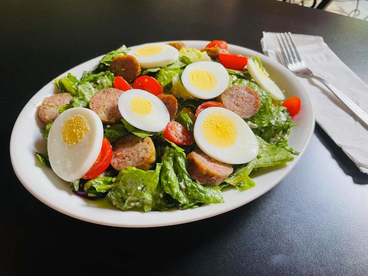 A special salad at Lino's in Rockford, pictured here on Aug. 11, 2021, is a 40-year-old recipe that includes Romano cheese, Romaine lettuce and a special house dressing made with oil, vinegar and spices. Lino's was announced a winner during the 2023 Rockford Region Restaurant Week.