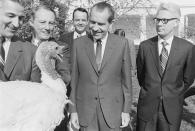 <p>President Richard Nixon gives the annual pardon to a Thanksgiving turkey on Nov.19, 1969 in Washington. (Photo: Wally McNamee/Corbis/Getty Images) </p>