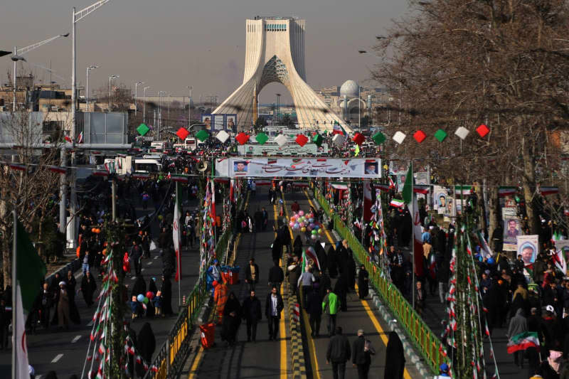 Iranian people take part in a rally marking the 45th anniversary of the Islamic Revolution in Tehran. Rouzbeh Fouladi/ZUMA Press Wire/dpa