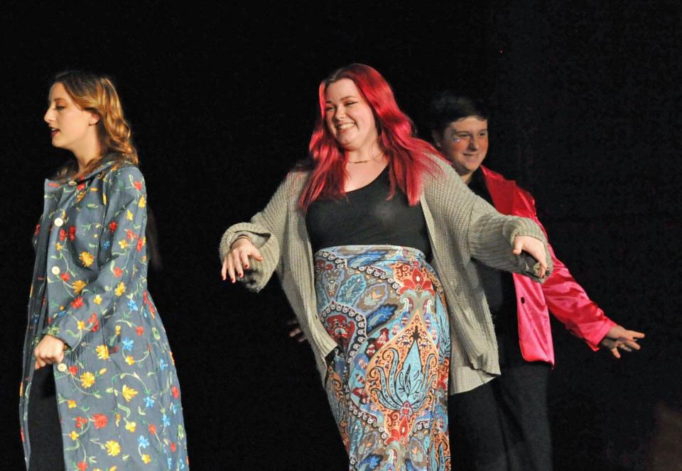 Quincy High School student Grace Cunniff models one of her designs during the Quincy High School Fashion Show on Thursday, May 12, 2022.