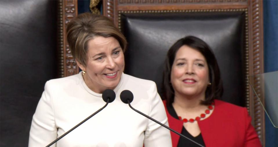 BOSTON - Gov. Maura Healey speaks after being sworn at the Statehouse Thursday. Lt. Gov. Kimberley Driscoll is seated on the right.