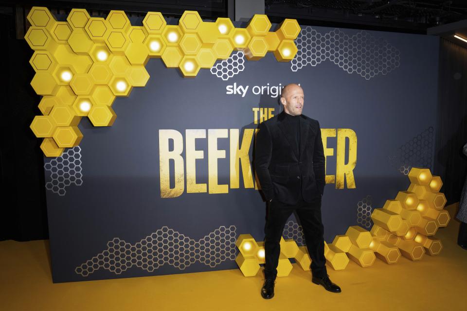 Jason Statham poses for photographers upon arrival at the UK premiere of the film 'The Beekeeper' on Wednesday, Jan. 10, 2024 in London. (Scott A Garfitt/Invision/AP)