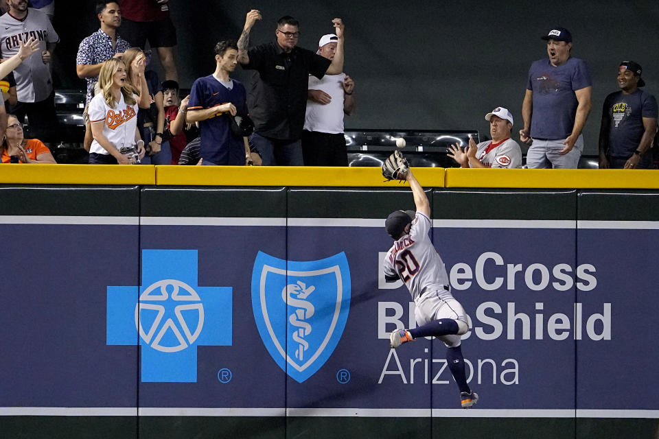 Houston Astros' Chas McCormick can't catch an RBI double hit by Arizona Diamondbacks' Gabriel Moreno during the ninth inning of a baseball game, Friday, Sept. 29, 2023, in Phoenix. (AP Photo/Matt York)