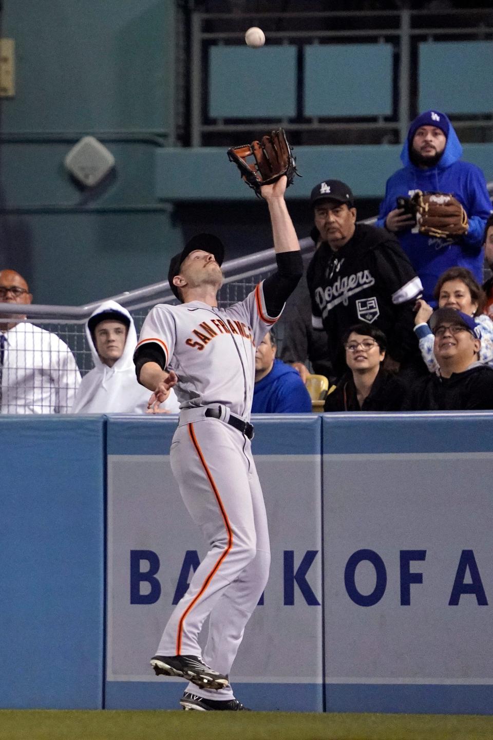 San Francisco Giants center fielder Austin Slater makes a catch on a fly ball against the Dodgers on May 3.