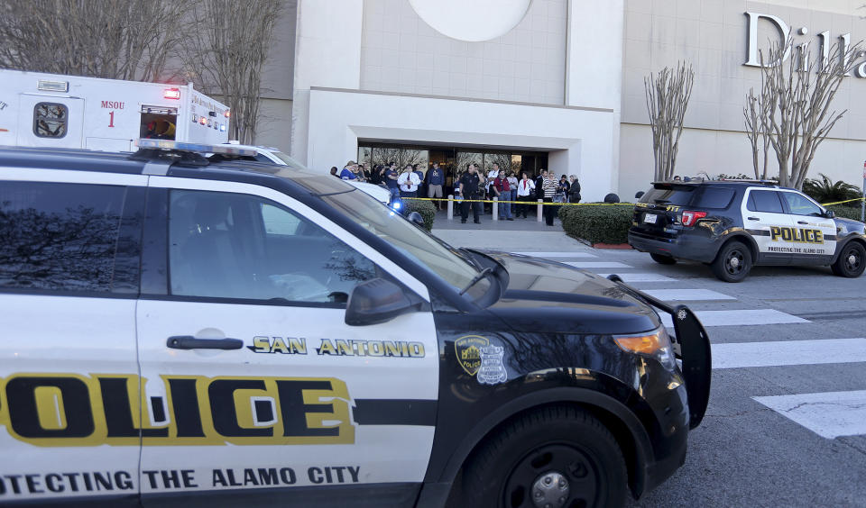 Law enforcement personnel work the scene after a deadly shooting at Rolling Oaks Mall in San Antonio, Texas, Sunday, Jan. 22, 2017. Authorities say several were injured after a robbery at the shopping mall. (Edward A. Ornelas/The San Antonio Express-News via AP)