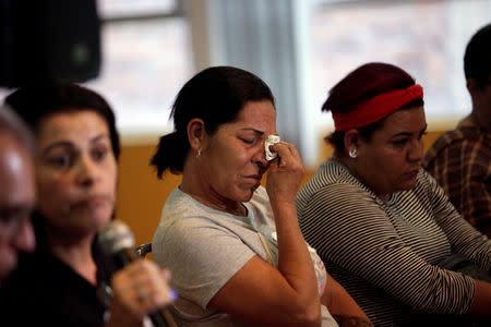 Maria del Carmen Diaz (C), mother of Jose Alfredo Gonzalez Diaz one of five youths killed in 2016 after police kidnapped them and then turned them over to members of a drug gang, reacts during a news conference in Mexico City, Mexico March 3, 2019. REUTERS/Daniel Becerril