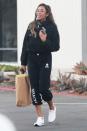 <p><i>Bachelorette</i> Tayshia Adams stocks up on beauty supplies in Newport Beach, California on Thursday. </p>