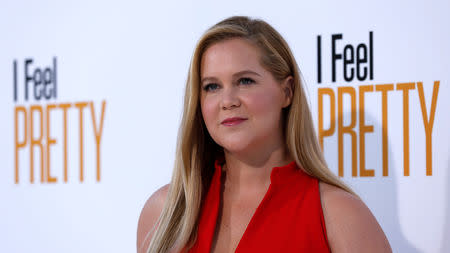 FILE PHOTO Cast member Amy Schumer poses at the premiere of "I Feel Pretty" in Los Angeles, California, U.S., April 17, 2018. REUTERS/Mario Anzuoni /File Photo