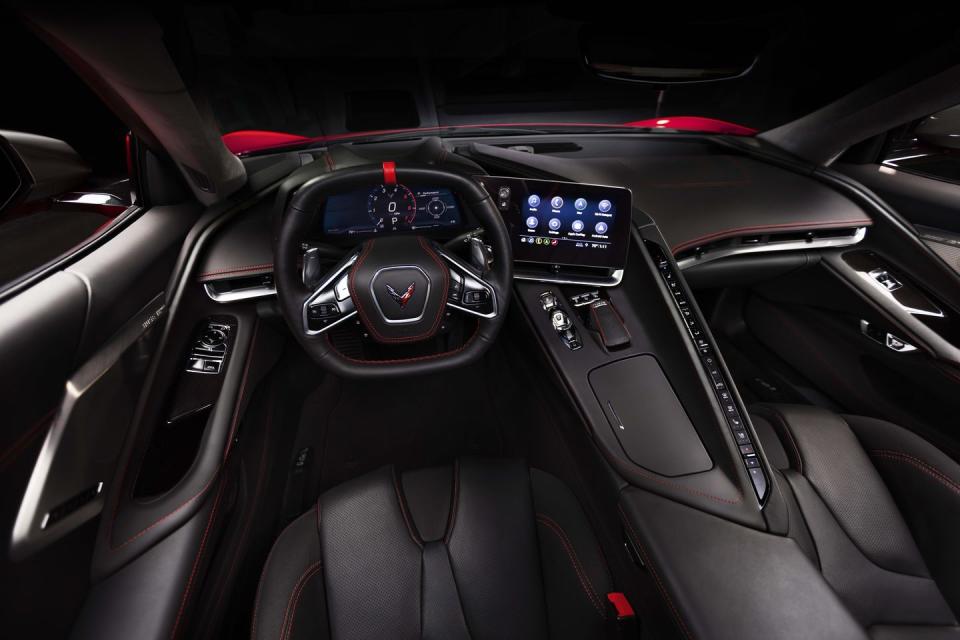 <p>The center console is not so much a center console as it is a cube wall, one with a row of tiny buttons on top. It’s part of an extreme makeover of the Corvette interior that also includes cupholders where a manual shifter would (should?) be.</p>