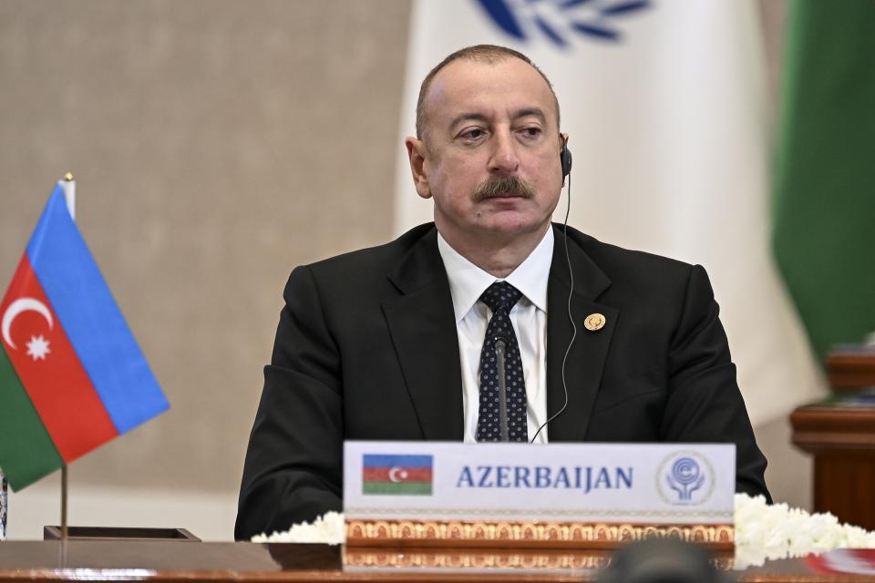 In this photo released by Uzbekistan's President Press Office, Azerbaijan's President Ilham Aliyev attends the Summit of the Economic Cooperation Organisation (ECO) in Tashkent, Uzbekistan, on Thursday, Nov. 9, 2023. (Uzbekistan's President Press Office via AP)