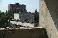 <p>Buildings stand in the abandoned city of Pripyat near the Chernobyl nuclear power plant on Aug. 18, 2017, in Pripyat, Ukraine. (Photo: Sean Gallup/Getty Images) </p>