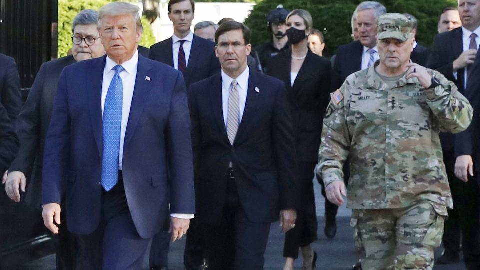 President Donald Trump departs the White House to visit outside St. John's Church in Washington, D.C. on June 1, 2020. Walking with him Trump from left are, Attorney General William Barr, Secretary of Defense Mark Esper and Gen. Mark Milley, chairman of the Joint Chiefs of Staff. (Patrick Semansky/AP)