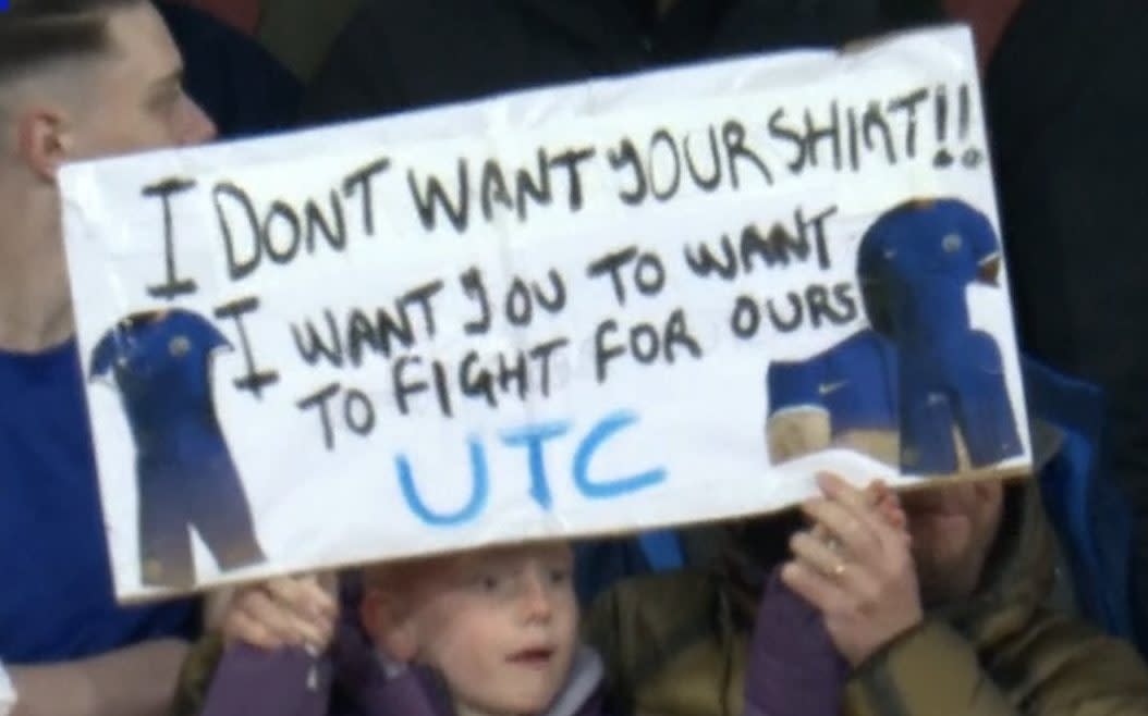 Young Chelsea supporter - Chelsea's indignity laid bare: Even children do not want their shirts