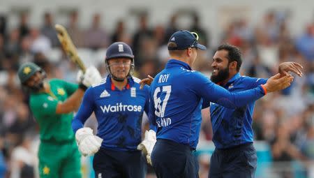 Britain Cricket - England v Pakistan - Fourth One Day International - Headingley - 1/9/16 England's Adil Rashid celebrates with Jason Roy after taking the wicket of Pakistan's Azhar Ali Action Images via Reuters / Lee Smith Livepic