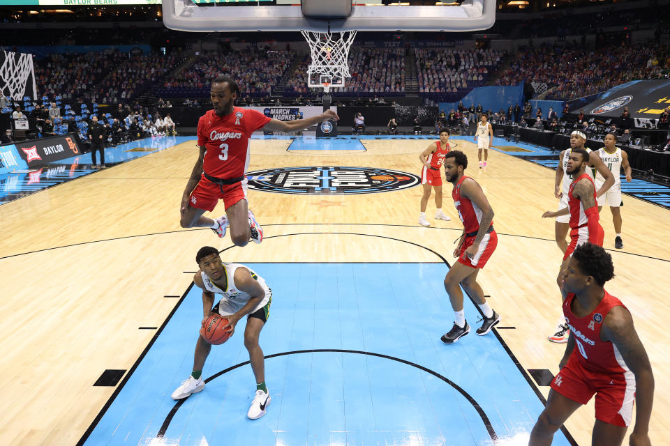 INDIANAPOLIS, INDIANA - APRIL 03: DeJon Jarreau #3 of the Houston Cougars defends a shot by Jared Butler #12 of the Baylor Bears in the first half of their Final Four semifinal game of the 2021 NCAA Men's Basketball Tournament at Lucas Oil Stadium on April 03, 2021 in Indianapolis, Indiana. (Photo by Jamie Schwaberow/NCAA Photos via Getty Images)