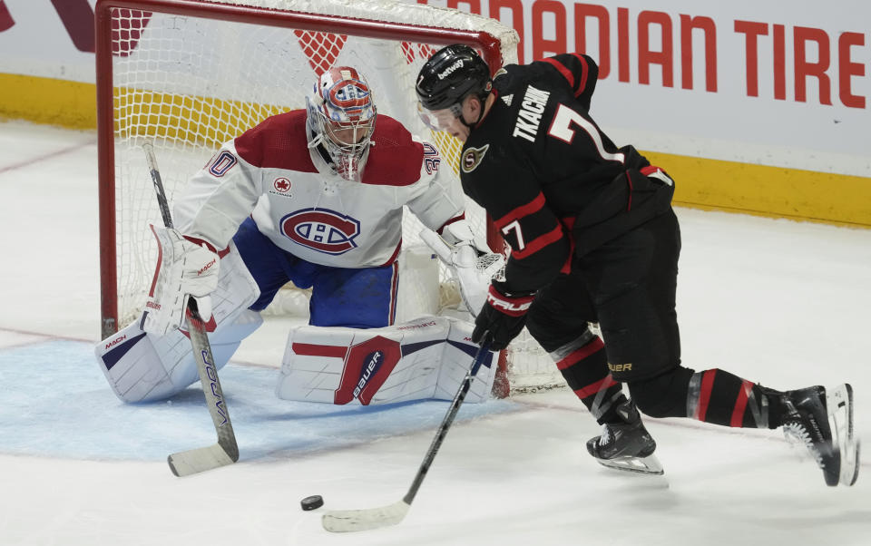 Ottawa Senators left wing Brady Tkachuk, right, tries to put the puck past Montreal Canadiens goaltender Cayden Primeau, left, during second-period NHL hockey game action in Ottawa, Ontario, Saturday, April 13, 2024. (Adrian Wyld/The Canadian Press via AP)