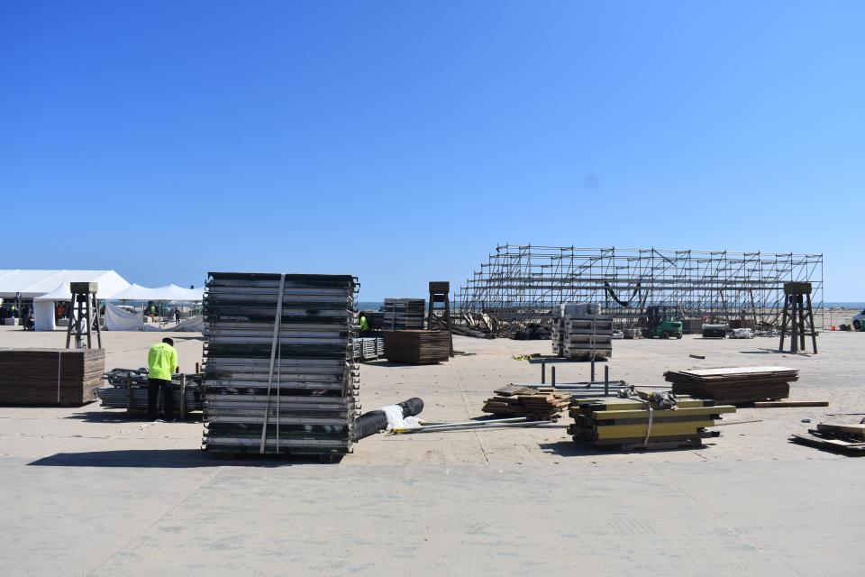 Workers tear down stages, bleachers and tents on Tuesday, October 3, 2023, after a successful inaugural Oceans Calling Festival on the Boardwalk in Ocean City, Maryland.