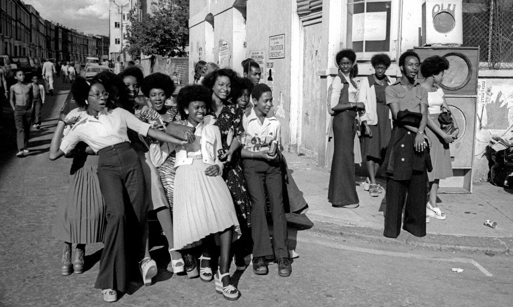 A crowd enjoying Notting Hill carnival in 1975.