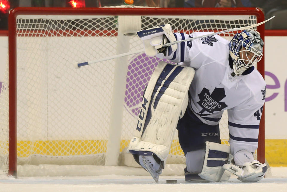 Toronto Maple Leafs goalie Jonathan Bernier reacts after giving up a goal to Colorado Avalanche center Matt Duchene in the shootout of the Avalanche&#39;s 4-3 victory in an NHL hockey game in Denver on Thursday, Nov. 6, 2014. (AP Photo/David Zalubowski)