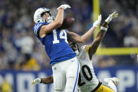 Indianapolis Colts' Alec Pierce (14) cannot make a catch against Pittsburgh Steelers' Cameron Sutton (20) during the second half of an NFL football game, Monday, Nov. 28, 2022, in Indianapolis. (AP Photo/AJ Mast)