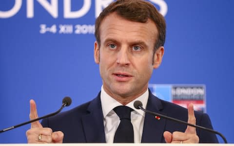 President Emmanuel Macron of France at a Nato summit near Watford - Credit: Hollie Adams/Bloomberg