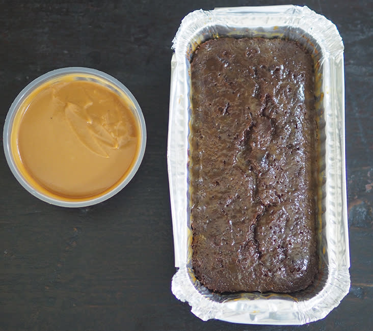 The sticky date pudding comes in an aluminium loaf tin with that decadent creamy toffee sauce in a separate container.