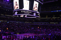 Players and fans stand for 24 seconds to honor Kobe Bryant before an NBA basketball game between the Chicago Bulls and the San Antonio Spurs Monday, Jan. 27, 2020, in Chicago. (AP Photo/David Banks)