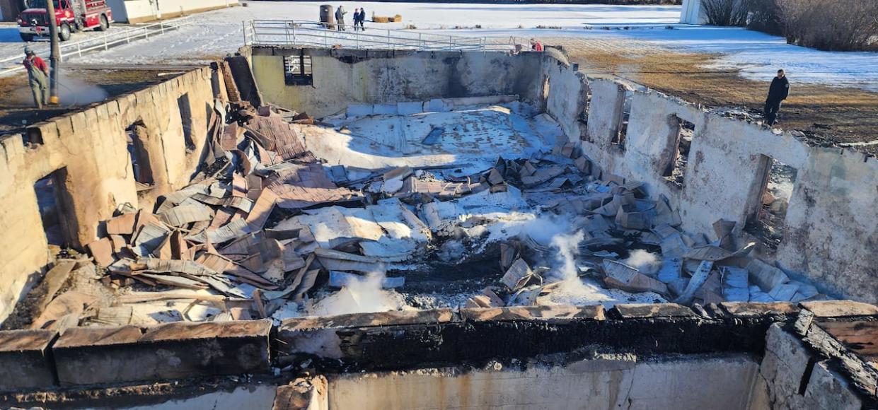 The remnants of the Beiseker Level-Land Seventh-day Adventist Church after a fire, determined to be arson, destroyed it in December. (Submitted by RCMP Alberta - image credit)