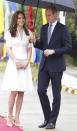 <p>Snapped at Paro Airport in Bhutan, before leaving to jet back to India, the Duchess wore a crisp, white ensemble and her trusty, nude Rupert Sanderson heels.<i> [Photo: PA Images]</i></p>