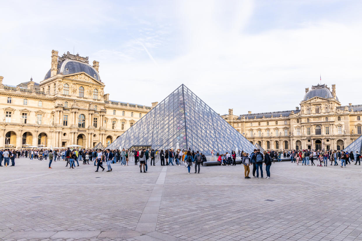 Louvre Museum in Paris, France is one of the most popular tourist attractions. 