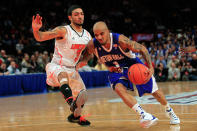 NEW YORK, NY - MARCH 07: Peyton Siva #3 of the Louisville Cardinals defends against Jordan Theodore #1 of the Seton Hall Pirates during their second round game of the Big East Men's Basketball Tournament at Madison Square Garden on March 7, 2012 in New York City. (Photo by Chris Trotman/Getty Images)