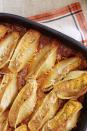 <p>Stuffed shells are classic comfort food for a reason: They're simple, filling, and easy to make. This recipe adds in a touch of fall flavor, and a little winter-squash nutrition.</p><p><strong><a href="https://www.countryliving.com/food-drinks/recipes/a3921/pumpkin-ricotta-stuffed-shells-recipe-clv1011/" rel="nofollow noopener" target="_blank" data-ylk="slk:Get the recipe;elm:context_link;itc:0;sec:content-canvas" class="link ">Get the recipe</a>.</strong> </p>