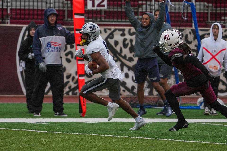 Monmouth's Dymere Miller picks up yardage against Lafayette on Sept. 23, 2023 in Easton, Pa.