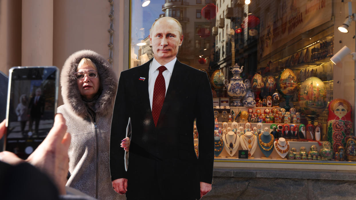  Russians vote in election Putin will win. 