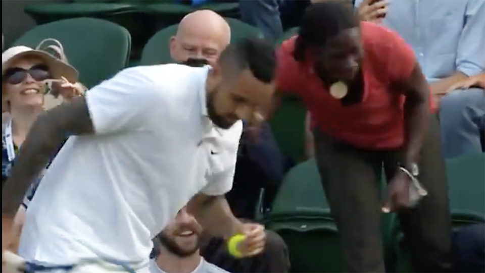 Nick Kyrgios asks a fan where to place his serve while on match point in Wimbledon's second round.