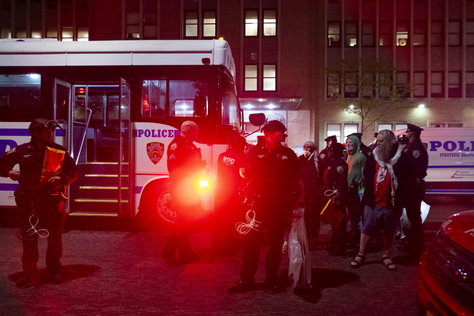 REPLACES CAPTION TO NYPD OFFICERS ARREST PRO-PALESTINIAN DEMONSTRATORS New York Police Department officers arrest Pro-Palestinian demonstrators on 114th Street and Amsterdam Avenue on Tuesday night, April 30, 2024. The NYPD also stormed Columbia University’s campus after Columbia University President Minouche Shafik called on the department to dismantle encampments and remove individuals from Hamilton Hall. (Seyma Bayram via AP)