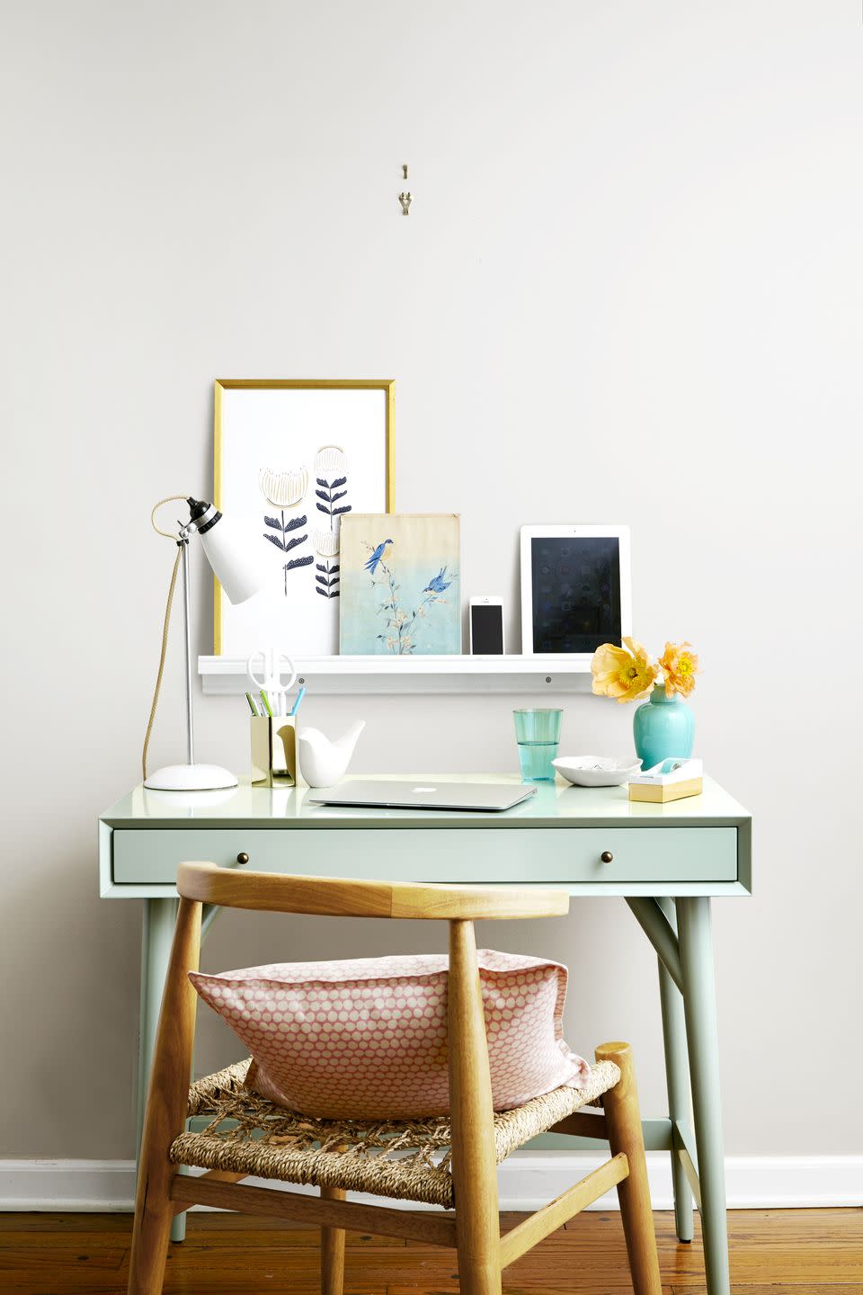 <p>Expand your work space with just a shelf and a few taps of a hammer, making room to store extra tech items or books. It's also a clever way to display artwork; you can easily swap in new frames or layer pieces that you love. </p>